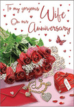 Spread out on a softly lit surface, this anniversary card arrangement looks like a moment of affection paused in time, the kind you might discover waiting on the dining table in an Elm Park flat before breakfast. At its heart is a neat cluster of classic red roses, their velvety petals unfurling in full, rounded blooms that seem almost touchable, as though you could brush your fingers over their satin-smooth edges and breathe in their gentle perfume. The roses nestle into a frame of deep green foliage, each leaf glossy and shapely, enhancing the depth of colour and giving the bouquet a freshly arranged, local-florist charm. Beside them lies a simple, elegant envelope, turned slightly so that its flap creates a diagonal line across the composition, hinting at a handwritten anniversary message inside. Just beyond, a piece of jewellery glimmers-a delicate chain with a heart or intertwined design-suggesting the intimacy of a gift chosen with care. A heart-shaped keepsake box rests nearby, its rich red surface smooth and reflective, like a small treasure chest for shared memories. Sprinkled across the card and surrounding area are tiny red hearts and sparkling accents, arranged like festive confetti left behind after a celebration at a favourite Elm Park café. A single butterfly motif flutters at the edge of the scene, lending a whimsical touch that speaks of romance and renewal. The soft daylight that bathes everything creates gentle shadows and a warm, inviting glow, turning this simple tabletop composition into a quiet tribute to years of companionship and love that continues to deepen with each passing anniversary.